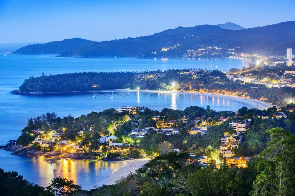 An aerial view of dusk over Patong and Karon beaches in Phuket, Thailand