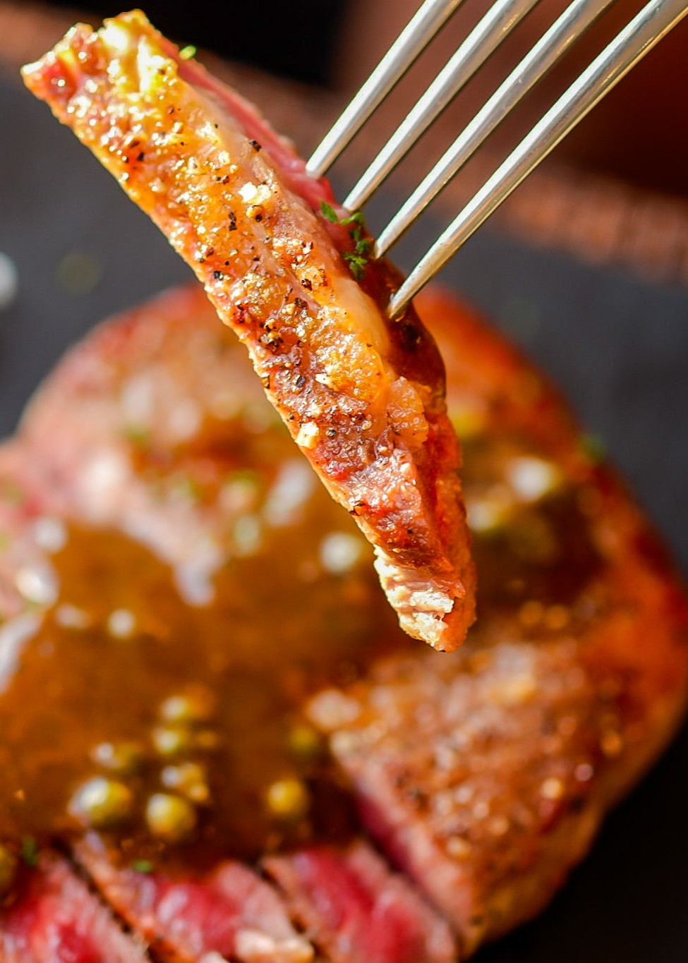 A Piece Of Steak On A Fork