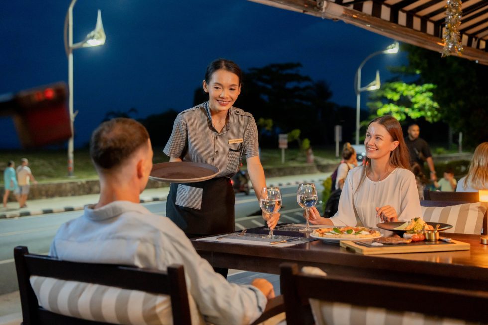A waitress serving at Ciao Pizza & Grill